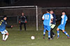 Action in front of the Tortorella Pools goal, Hampton FC(dark blue) Tortorella Pools(royal blue)