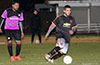 Mario Olaya of Maidstone Market protecting the ball from Rigo Gonzalez of FC Tuxpan