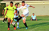 Gonzalo Presedo of Bateman Painting(right) kicking the ball past Gehider Garcia of Hampton FC
