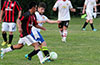 Andres Arango of Bateman Painting(rear) protecting the ball from Pedro Cristobal of Sag Harbor