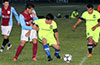 Clinton Perez of Hampton FC holding off Eddy Juarez of Maidstone Market
