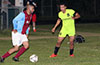 Mathew Ramirez of Maidstone Market dribbling by Gehider Garcia of Hampton FC
