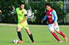 Eddy Juarez of Maidstone Market watching what Gehider Garcia will do with the ball