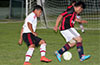Carlos Portillo of Bateman Painting(left) about to catch Jose Balo of Sag Harbor United