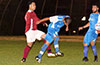 Cristian Munoz of Tortorella Pools heading the ball in front of Jorge Alverado of Maidstone Market(left)