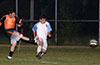 Ernesto Valverde of Maidstone Market(blasting) the ball past Marlon Guzman of Sag Harbor