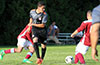 Eddy Juarez of Hampton FC(center) looking to his left to see what Xavi Piedramartel of Maidstone Market will do with the ball