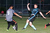 Gonzalo Presedo of Bateman Painting(center) reaching for the ball held by Cristian Flores of Hampton FC