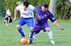 Emilio Espinoza of Maidstone Market(rear) holding off a Bonac FC forward