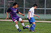 Jorge Alvarado of Maidstone(left) about to get by a Manfred Barros of Bonac FC