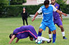 David Rodriguez of Tortorella Pools(center) thinking of getting the ball away from Xavi Piedramartel of Maidstone