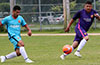 Jose Gutierrez of FC Tuxpan(left) hitting the ball past Emilio Espinoza of Maidstone Market