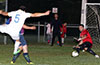 Jon Bedoya of Hampton Construction(#5) blasted a shot that Maidstone Market goalie, Alex Mesa, saved