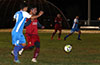 David Rodriguez of Tortorella Pools(left) and Adrian Mora of FC Tuxpan going for the ball