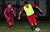 Donald Martinez of FC Tuxpan about to dribble by Jhon Guanga of East Hampton SC