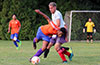 Donte Donigal of EH Soccer Fever falling over Donald Martinez of FC Tuxpan