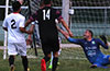 Diego Pitirris of FC Palora saving the shot taken by Donald Martinez of FC Tuxpan(#14)