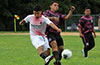 William Solis of FC Palora(left) and Christian Neira of FC Tuxpan fighting for the ball