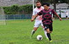 Bryan Cueva of FC Palora(rear) holding back Faustino Meza of FC Tuxpan