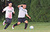 William Solis of FC Palora(left) trying to catch Gustavo Gutama of East Hampton SC