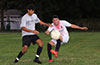Robert Cueva of FC Palora blasting the ball past Jorge Naula of East Hampton SC
