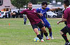 Mark Bako of East Hampton SC(front) holding off Cristian Gonzalez of Tortorella Pools(rear)
