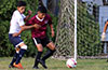 Robert Velez of East Hampton SC protecting the ball from a Liga de Gulag forward