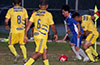 Uchipaillie Esteban of Tortorella Pools surrounded by the FC Tuxpan defense