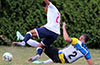 Bryan Cueva of Maidstone Market(#2) slide tackling a Liga de Gulag forward