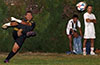 Wilson Tacuri of FC Tuxpan blasting the ball up the field