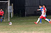Jeremias Simon of FC Tuxpan(front) and Romulo Tubatan of Tortorella Pools(rear) racing toward the ball