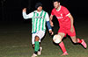 Carlos Rodriguez of Maidstone(left) and Miguel Reyes of Sag Harbor racing toward the ball