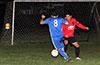 Mario Olaya of Tortorella Pools(#8) getting by Jhon Guanga of Liga de Gulag
