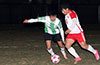 Faustion Meza of FC Tuxpan(right) trying to get by Jorge Naula of Maidstone Market