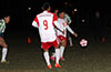 Faustion Meza of FC Tuxpan(center) in the middle of the action
