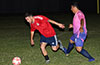 Manual Ramos of East Hampton SC(left) getting by a FC Tuxpan player