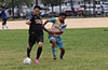Maicol Parra of Maidstone Market(left) fighting for the ball with a FC Tuxpan defender