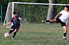 Lenis Vera of FC Tuxpan blasting the ball up the field